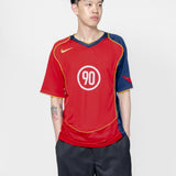 Total 90 Soccer Jersey GYM RED/MIDNIGHT NAVY/UNIVERSITY GOLD IB4208-687